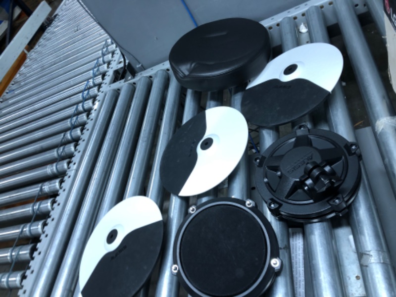 Photo 3 of Alesis Drums Debut Kit – Kids Drum Set With 4 Quiet Mesh Electric Drum Pads, 120 Sounds, Drum Stool, Drum Sticks, Headphones and 60 Melodics Lessons Debut Junior Drum Kit Drum Kit