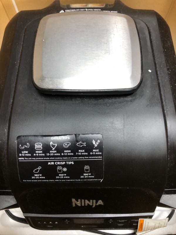 Photo 2 of *** POWERS ON *** Ninja AG301 Foodi 5-in-1 Indoor Grill with Air Fry, Roast, Bake & Dehydrate, Black/Silver Black/Silver 4-Quart Indoor Grill