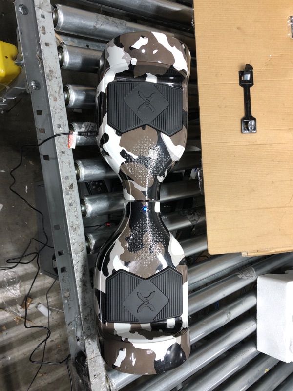 Photo 2 of *POWERS ON*
Hover-1 Helix Electric Hoverboard | 7MPH Top Speed, 4 Mile Range, 6HR Full-Charge, Built-in Bluetooth Speaker, Rider Modes: Beginner to Expert Hoverboard Camo