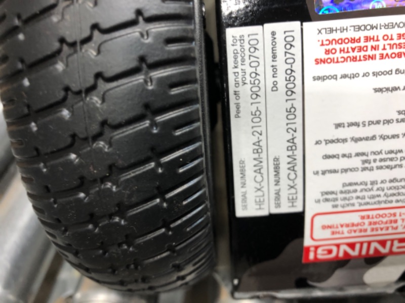 Photo 1 of *POWERS ON*
Hover-1 Helix Electric Hoverboard | 7MPH Top Speed, 4 Mile Range, 6HR Full-Charge, Built-in Bluetooth Speaker, Rider Modes: Beginner to Expert Hoverboard Camo