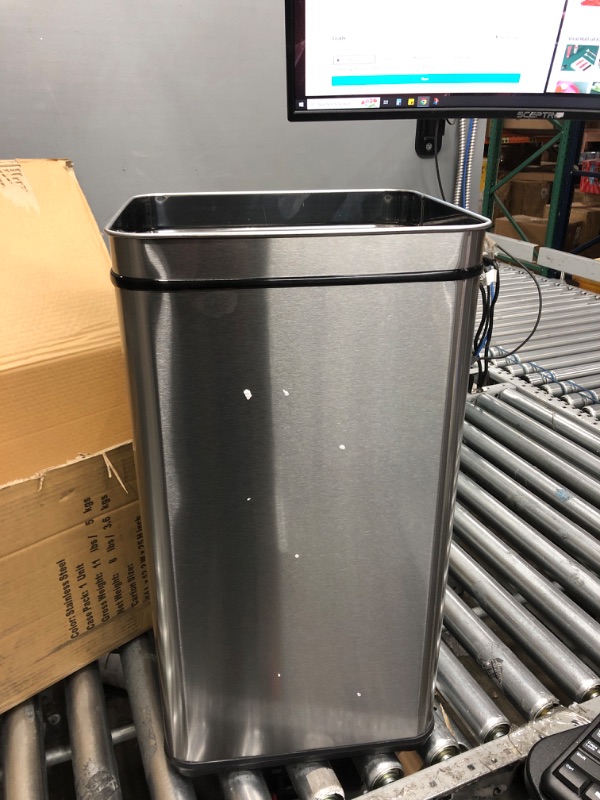 Photo 2 of *NOT TESTED*
iTouchless 13 Gallon Automatic Trash Can with Odor-Absorbing Filter and Lid Lock, Power by Batteries (not included) or Optional AC Adapter (sold separately), Black / Stainless Steel