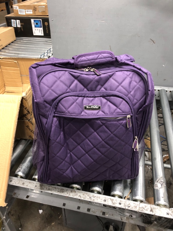 Photo 4 of *ZIPPER IS CUAGHT IN THE SMALL POCKET*
Rockland Melrose Upright Wheeled Underseater Carry-On Luggage, Purple, 16-Inch Carry-On 16-Inch Purple