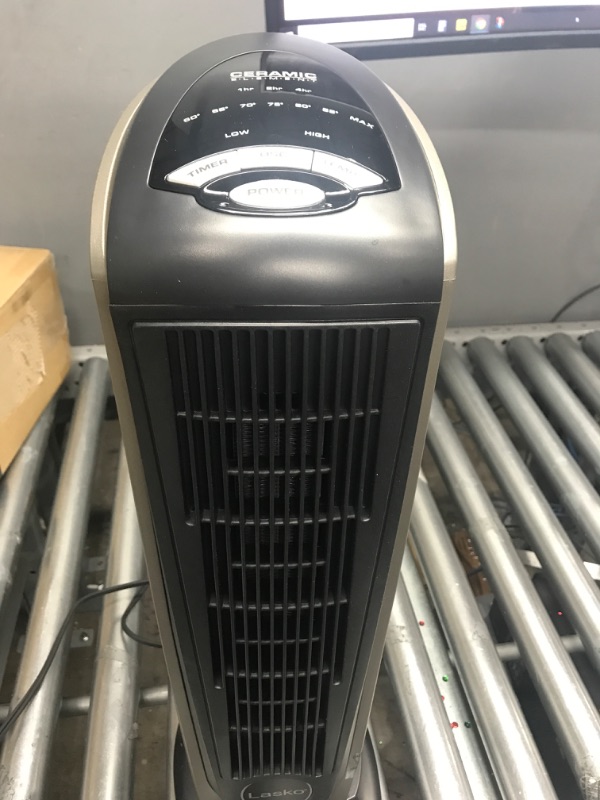 Photo 3 of **** POWERS ON *** Lasko Oscillating Ceramic Tower Space Heater for Home with Adjustable Thermostat, Timer and Remote Control, 22.5 Inches, Grey/Black, 1500W, 751320