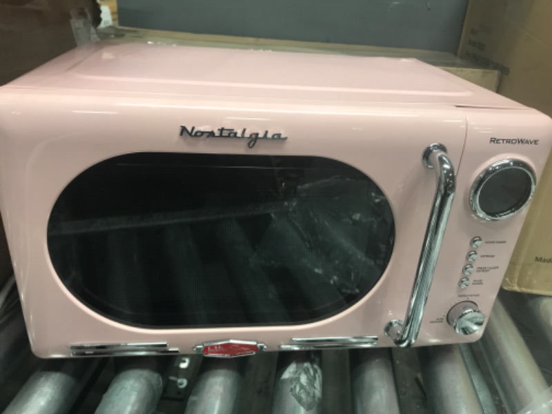 Photo 4 of *** POWERS ON *** Nostalgia Retro Compact Countertop Microwave Oven, 0.7 Cu. Ft. 700-Watts with LED Digital Display, Child Lock, Easy Clean Interior, Pink Pink Microwave