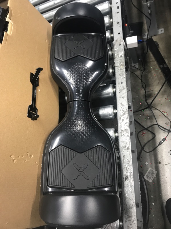 Photo 2 of *** POWERS ON *** Hover-1 Helix Electric Hoverboard | 7MPH Top Speed, 4 Mile Range, 6HR Full-Charge, Built-in Bluetooth Speaker, Rider Modes: Beginner to Expert Hoverboard Black