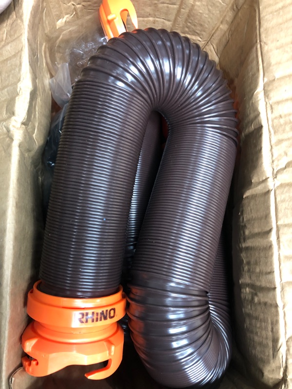 Photo 2 of Camco 20' (39742) RhinoFLEX 20-Foot RV Sewer Hose Kit, Swivel Transparent Elbow with 4-in-1 Dump Station Fitting-Storage Caps Included , Black , Brown 20ft Sewer Hose Kit Frustration-Free Packaging