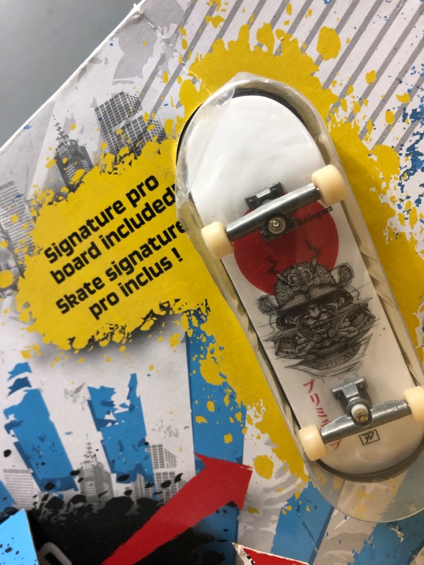 Photo 2 of TECH DECK - Ultimate Half-Pipe Ramp and Exclusive Primitive Pro Model Finger Board, for Ages 6 and Up