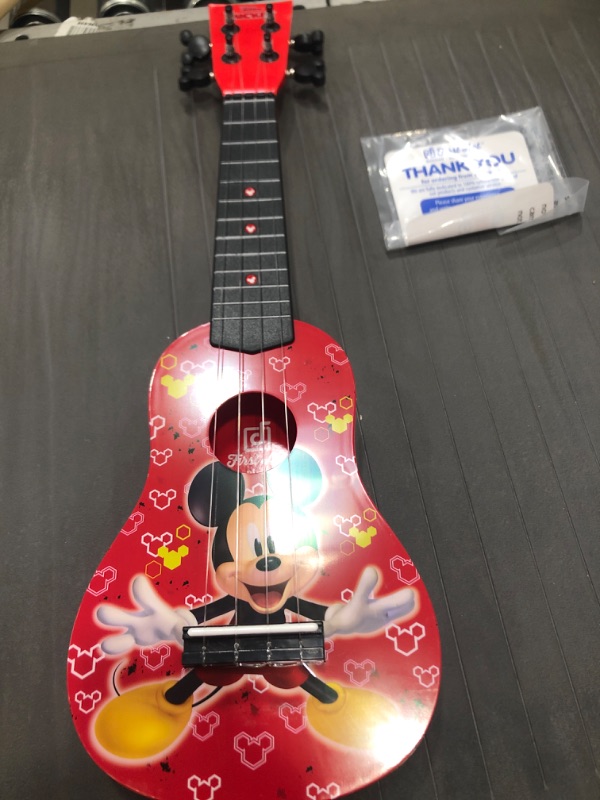 Photo 2 of First Act Mickey Mouse Toy Ukulele, 20 Inch - Ukulele for Beginners, Musical Instruments for Toddlers and Preschoolers - Features Your Child’s Favorite Disney Character