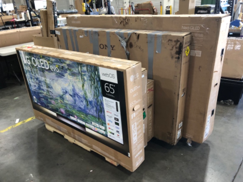 Photo 1 of PALLET OF DAMAGED TVS NO REFUNDS OR RETURNS 