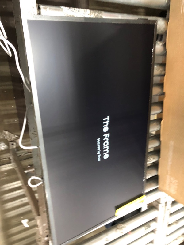 Photo 1 of SAMSUNG 32-Inch Class QLED LS03B Series The Frame Quantum HDR Smart TV with Alexa Built-in (QN32LS03BBFXZA, Latest Model)
