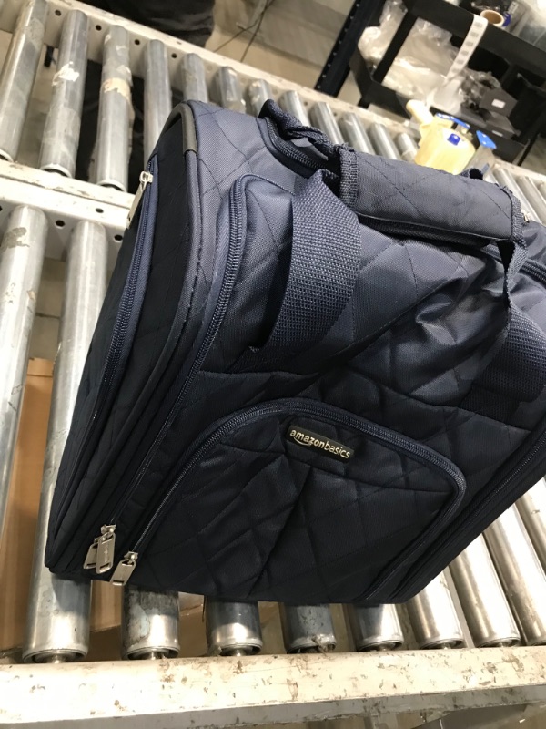 Photo 2 of Amazon Basics Underseat Carry-On Rolling Travel Luggage Bag, 14 Inches, Navy Blue Quilted Navy Blue Quilted Luggage Bag