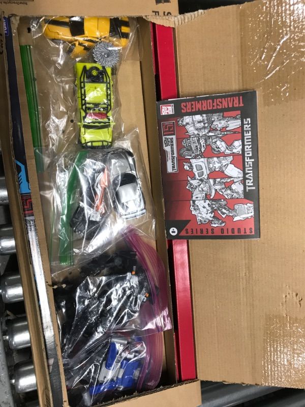 Photo 2 of damaged  TRANSFORMERS TOYS STUDIO SERIES TRANSFORMERS MOVIE 1 15TH ANNIVERSARY MULTIPACK WITH 5 ACTION FIGURES - AGES 8 AND UP (AMAZON EXCLUSIVE)
