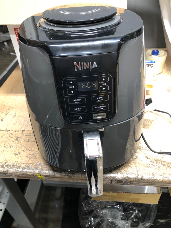 Photo 2 of Ninja AF101 Air Fryer that Crisps, Roasts, Reheats, & Dehydrates, for Quick, Easy Meals, 4 Quart Capacity, & High Gloss Finish, Black/Grey 4 Quarts