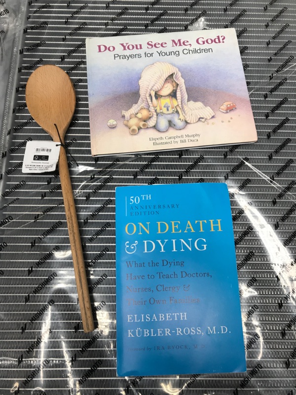 Photo 1 of **bundle of 3 items**
2 books and wooden spoon