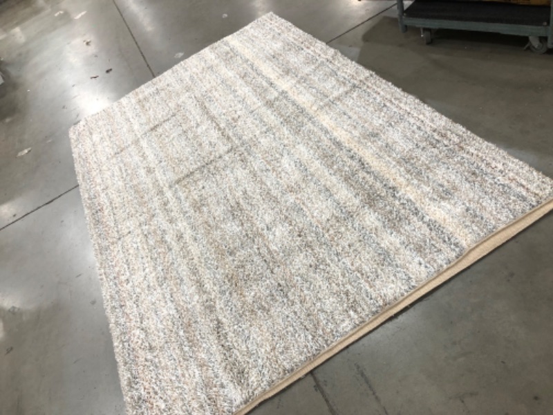 Photo 3 of **USED-NEEDS CLEANING**
**8' 9" X 12FT white grey beige rug, view photos for detail**
