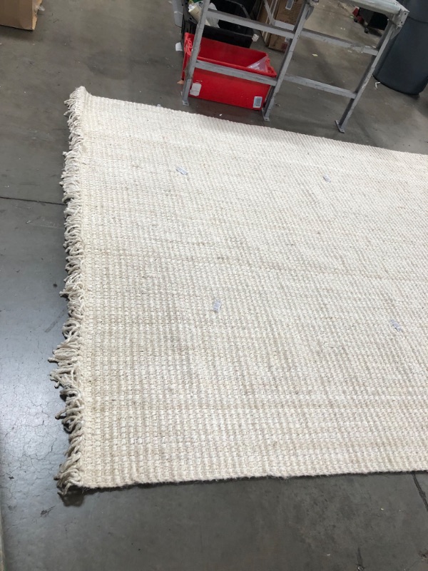 Photo 5 of **USED-NEEDS CLEANING**
7' 6" x 9' 10"  white natural rug, view photos for detail