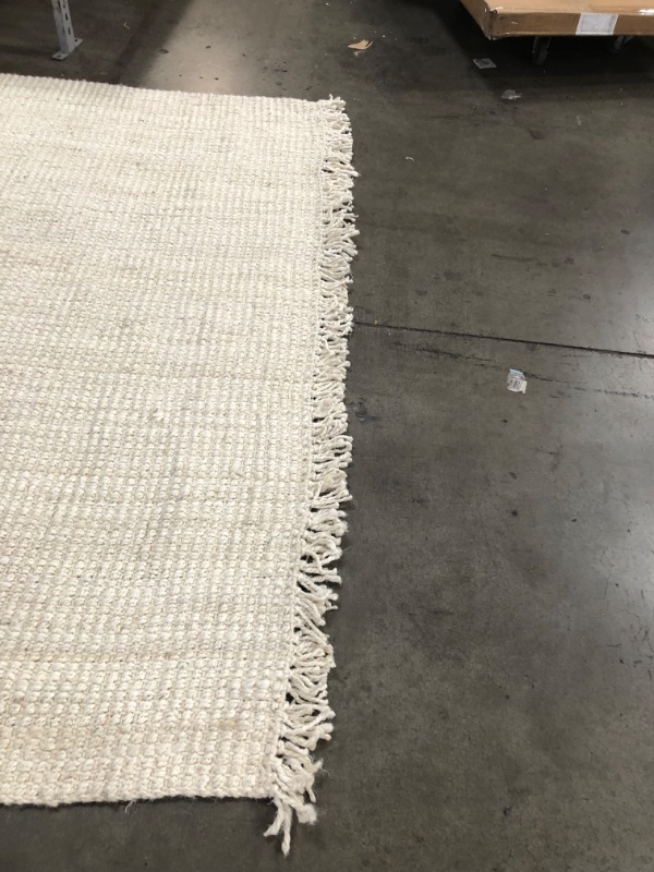 Photo 4 of **USED-NEEDS CLEANING**
7' 6" x 9' 10"  white natural rug, view photos for detail