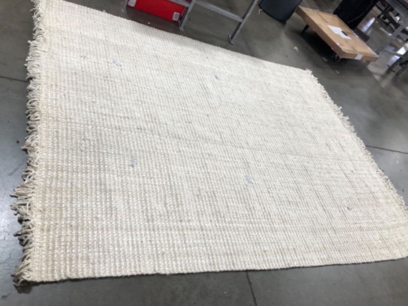 Photo 2 of **USED-NEEDS CLEANING**
7' 6" x 9' 10"  white natural rug, view photos for detail
