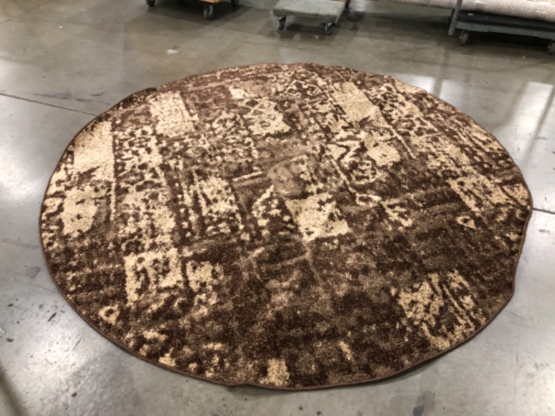 Photo 3 of **USED-NEEDS CLEANING** 
8FT ROUND BROWN RUG, VIEW PHOTOS!!!