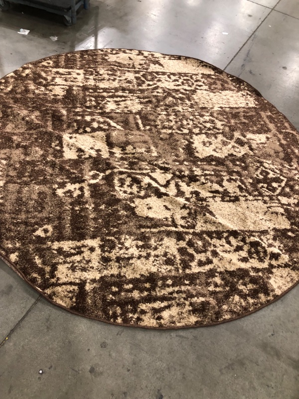Photo 4 of **USED-NEEDS CLEANING** 
8FT ROUND BROWN RUG, VIEW PHOTOS!!!