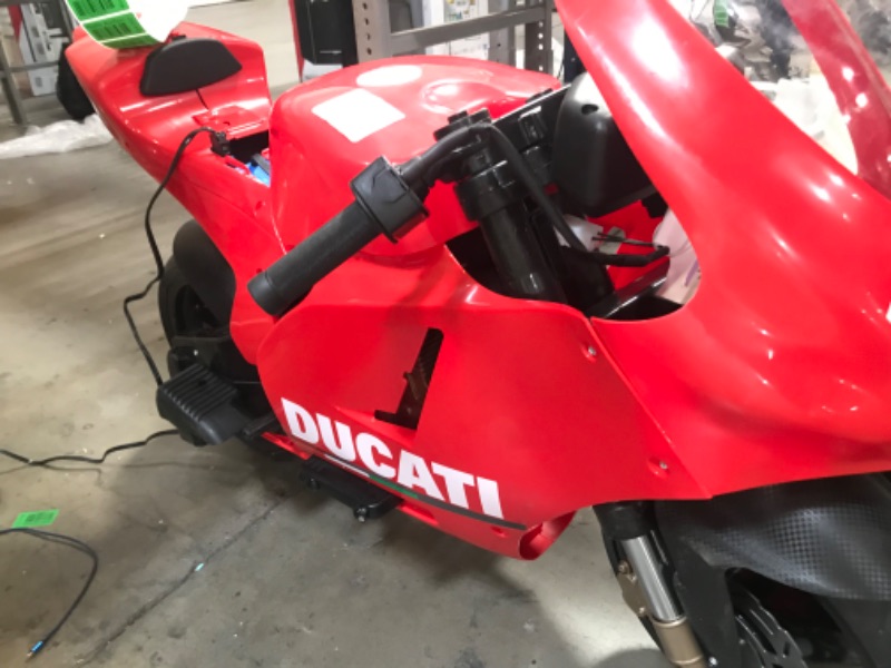 Photo 8 of INCOMPLETE-Peg Perego Ducati GP Motorcycle 12 Volt Ride on, Red
