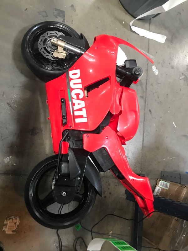 Photo 4 of INCOMPLETE-Peg Perego Ducati GP Motorcycle 12 Volt Ride on, Red
