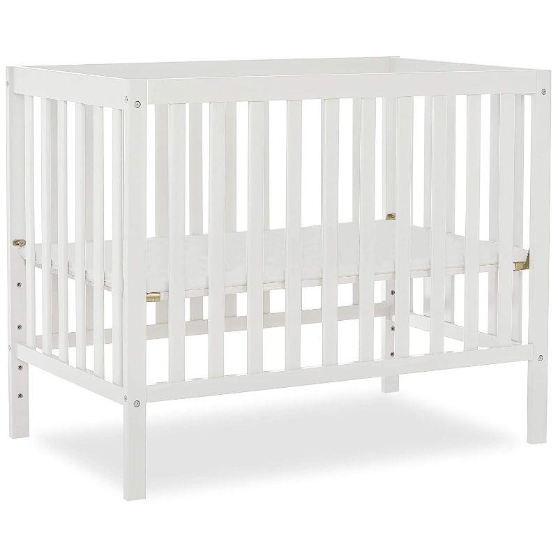 Photo 1 of Dream On Me Edgewood 4-In-1 Convertible Mini Crib In White, JPMA Certified, Non-Toxic Finish, New Zealand Pinewood, With 3 Mattress Height Settings, Included 1" Mattress Pad
