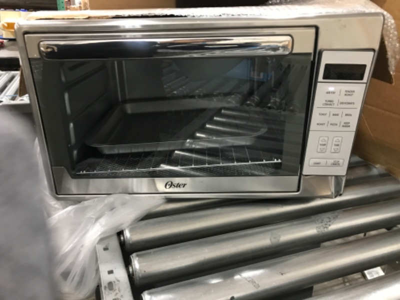 Photo 1 of ***TESTED POWER ON***Oster Air Fryer Oven, 10-in-1 Countertop Toaster Oven Air Fryer Combo, 10.5" x 13" Fits 2 Large Pizzas, Stainless Steel Convection Oven with Air Fry