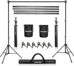 Photo 1 of Aureday Backdrop Stand, 7x10Ft Adjustable Photo Backdrop Stand Kit with 4 Crossbars, 6 Background Clamps, 2 Sandbags, and Carrying Bag for Parties/Wedding/Photography/Festival Decoration