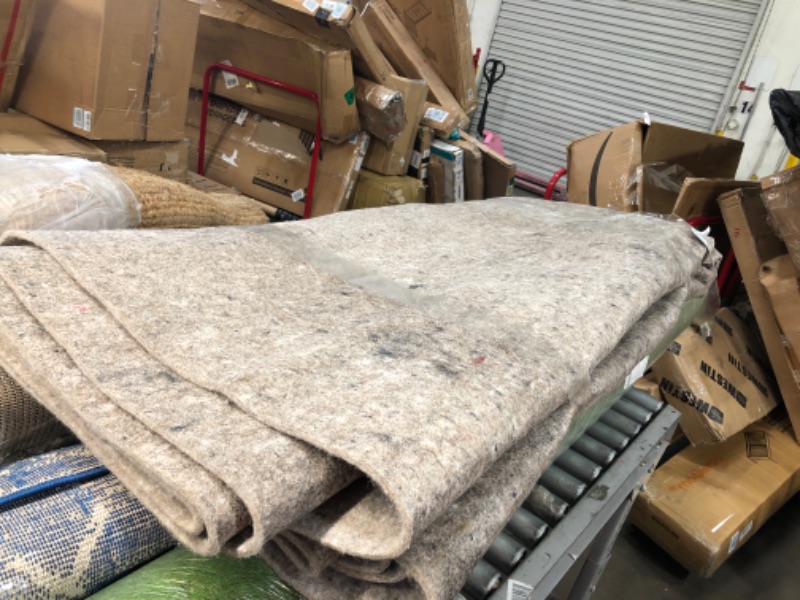 Photo 1 of **used utem & dirty**
- Basics - 7'10" x 9'10" Rug Pad