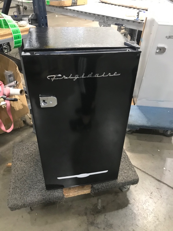 Photo 7 of *SMALL DENTS/SEE NOTES/MISSING HARDWARE** FRIGIDAIRE  3.1 Cu Ft Black Retro Bar Fridge with Side Bottle Opener (33" TALL x 18") BLACK
