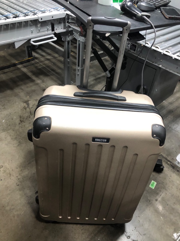 Photo 2 of **ONE WHEEL MISSING**
Kenneth Cole Reaction Renegade 28” Check Size Luggage Lightweight Hardside Expandable 8-Wheel Spinner Travel Suitcase, Champagne, inch Champagne 28-inch Checked