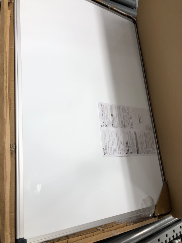 Photo 2 of Minor damage ** Amazon Basics Magnetic Dry Erase White Board, 36 x 24-Inch Whiteboard - Silver Aluminum Frame 24" x 36" Magnetic, Aluminum Frame