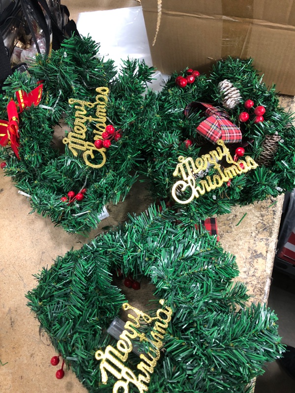 Photo 2 of *** UNABLE TO TEST *** TURNMEON 3 Pack Prelit Christmas Wreath with Lights for Front Door, Merry Christmas Wreath Bow Pinecone Red Berry Battery Operated Holiday Xmas Decorations Window Cabinets Outdoor Indoor Home(13 Inch)