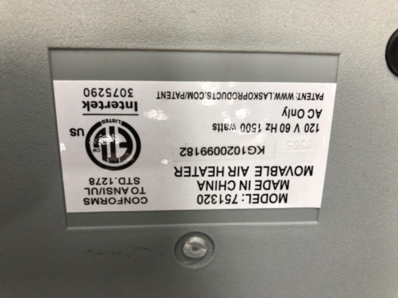 Photo 1 of Lasko Oscillating Ceramic Tower Space Heater for Home with Adjustable Thermostat, Timer and Remote Control, 22.5 Inches, Grey/Black, 1500W, 751320