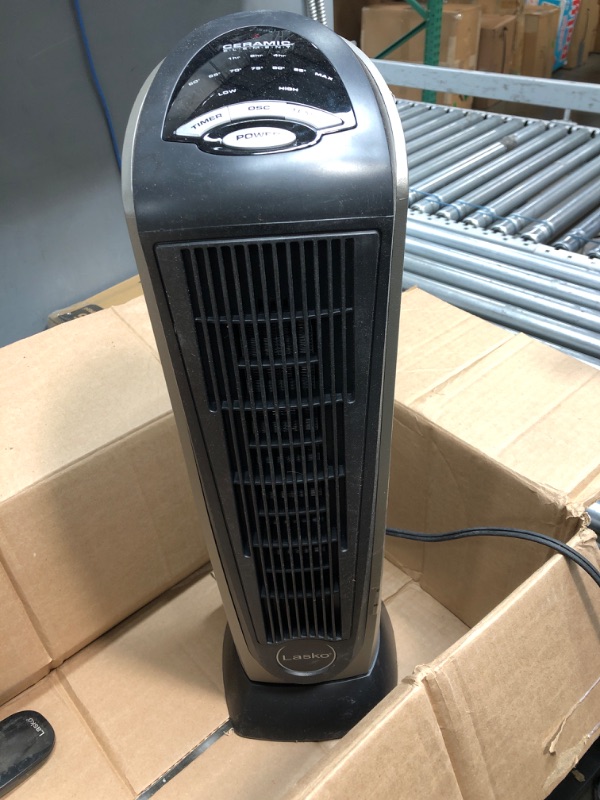 Photo 1 of Lasko Oscillating Ceramic Tower Space Heater for Home with Adjustable Thermostat, Timer and Remote Control, 22.5 Inches, Grey/Black, 1500W, 751320
