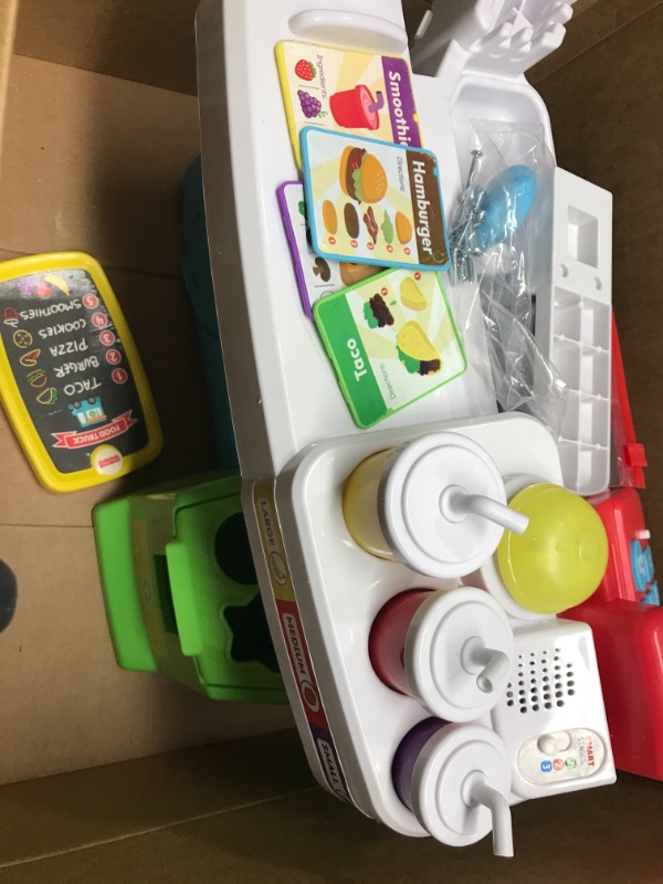 Photo 4 of *Missing Accessories & Instructions/Unknown Missing Hardware*Fisher-Price Laugh & Learn Servin' Up Fun Food Truck, interactive play center with Smart Stages learning content for toddlers ages 18 months and up
