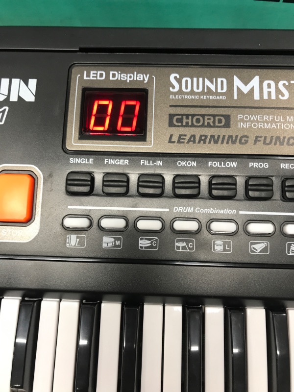 Photo 1 of *** POWERS ON *** BIGFUN Keyboard Piano for Kids, 61Key Multifunction Electric Piano Keyboard Educational Instrument Toy for 3 4 5 6 7 8 9 10 11 12 Years Old Boys and Girls with Microphone (Black) Special Edition