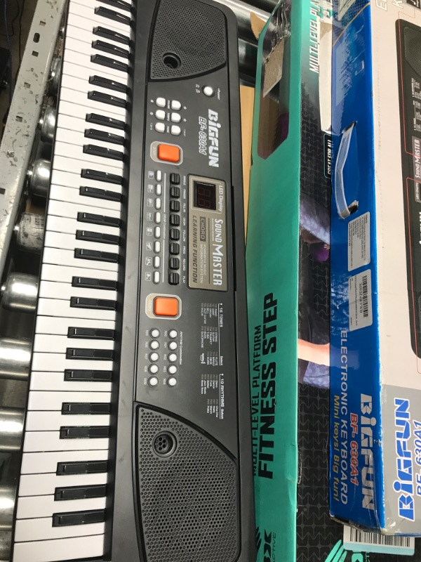 Photo 1 of *** POWERS ON *** BIGFUN Keyboard Piano for Kids, 61Key Multifunction Electric Piano Keyboard Educational Instrument Toy for 3 4 5 6 7 8 9 10 11 12 Years Old Boys and Girls with Microphone (Black) Special Edition