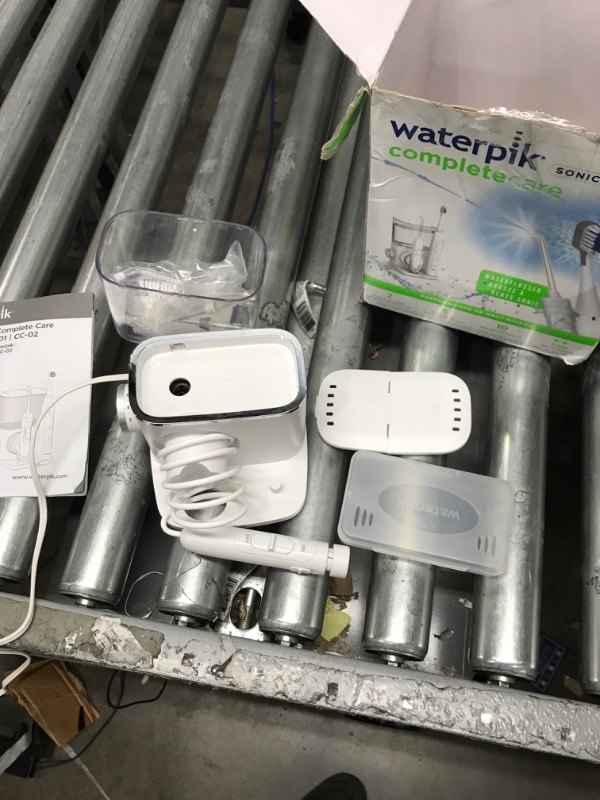 Photo 3 of ***TESTED POWER WORKING*** Waterpik Complete Care 9.0 Sonic Electric Toothbrush with Water Flosser, CC-01 White, 11 Piece Set