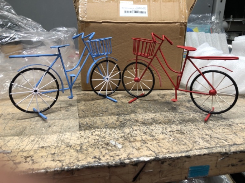 Photo 1 of 2 SMALL METAL BIKES BLUE AND RED 