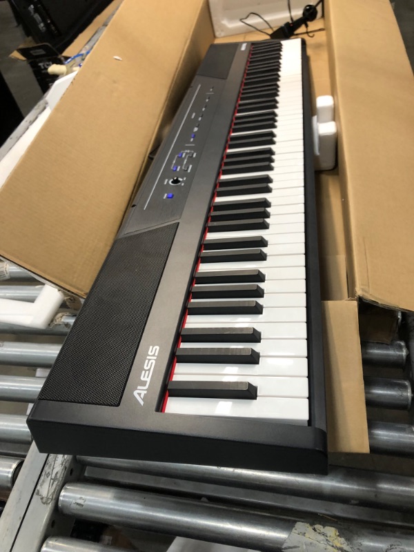 Photo 2 of Alesis Recital – 88 Key Digital Piano Keyboard with Semi Weighted Keys, 2x20W Speakers, 5 Voices, Split, Layer and Lesson Mode, FX and Piano Lessons
