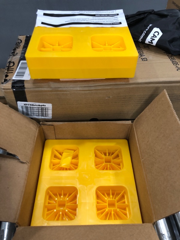 Photo 2 of Camco Heavy-Duty Leveling Blocks | Compatible with Single Wheels, Double Wheels, Hydraulic Jacks, Tongue Jacks and More | Yellow | 10-pack (44510) Leveling Blocks - 10 Pack Frustration Free Packaging