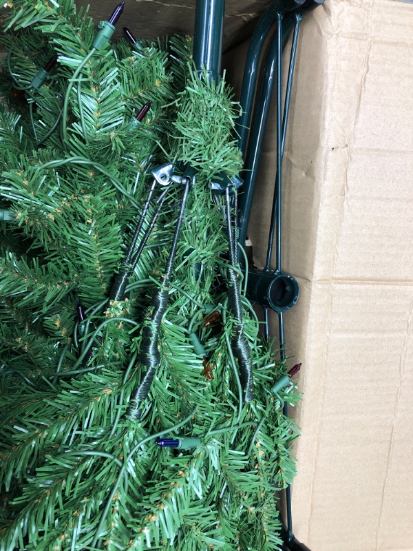 Photo 3 of *Tested* National Tree Company Artificial Pre-Lit Slim Christmas Tree, Green, Kingswood Fir, Multicolor Lights, Includes Stand, 7 Feet 7 ft