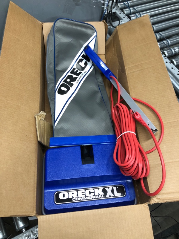 Photo 2 of ***TESTED AND WORKS***   Oreck Commercial XL2100RHS XL Commercial 12-1/2 in. x 9-1/4 in. x 47-3/4 in. Upright Vacuum - Gray/Blue
