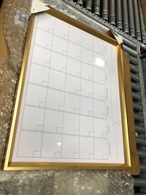 Photo 2 of **MINOR DAMAGE** DesignOvation Calter Modern Framed Magnetic Dry Erase Monthly Calendar, Gold Gold 21.5x27.5