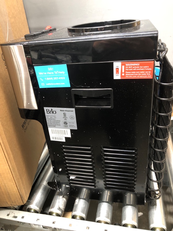 Photo 2 of **MINOR DAMAGE** Brio Limited Edition Top Loading Countertop Water Cooler Dispenser with Hot Cold and Room Temperature Water. UL/Energy Star Approved