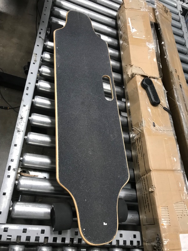 Photo 4 of **NICOMPLETE,NOT FUNCTIONAL**Electric Skateboard Youth Electric Longboard with Wireless Remote Control, 12 MPH Top Speed, 10 KM Range, 7 Layers Maple Longboard(US Stock)
**MISSING CHARGER,WAS NOT TESTED**