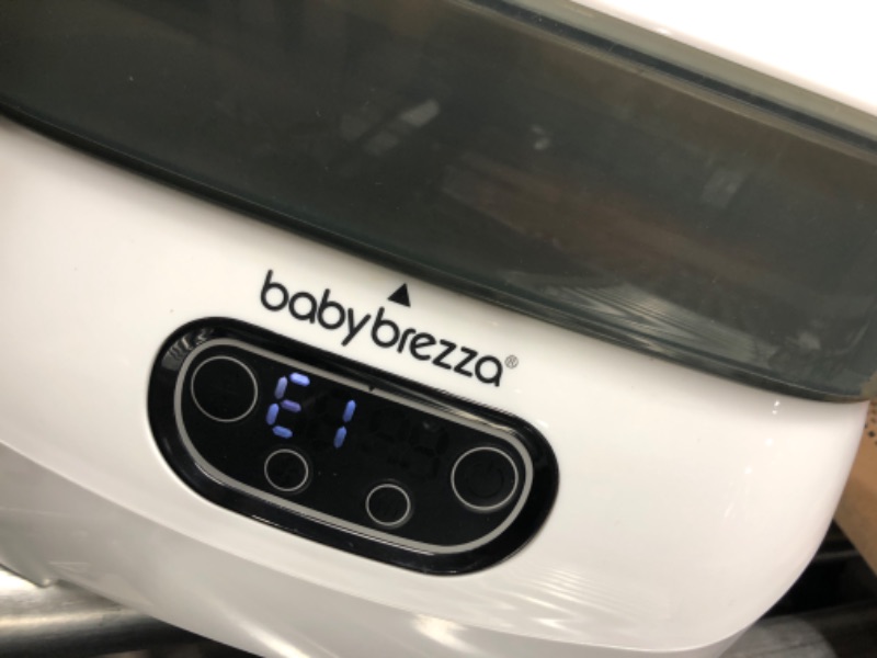 Photo 4 of Baby Brezza Baby Bottle Sterilizer and Dryer Advanced – Electric Steam Sterilization Machine – Universal Sterilizing for All Bottles: Plastic + Glass + Pacifiers + Breast Pump Parts - HEPA Filtration