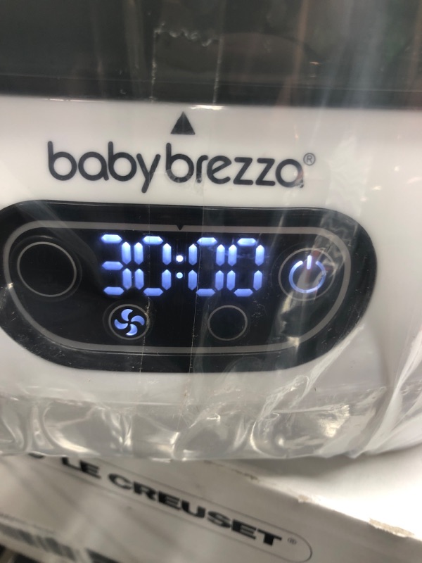 Photo 4 of Baby Brezza Baby Bottle Sterilizer and Dryer Advanced – Electric Steam Sterilization Machine – Universal Sterilizing for All Bottles: Plastic + Glass + Pacifiers + Breast Pump Parts - HEPA Filtration